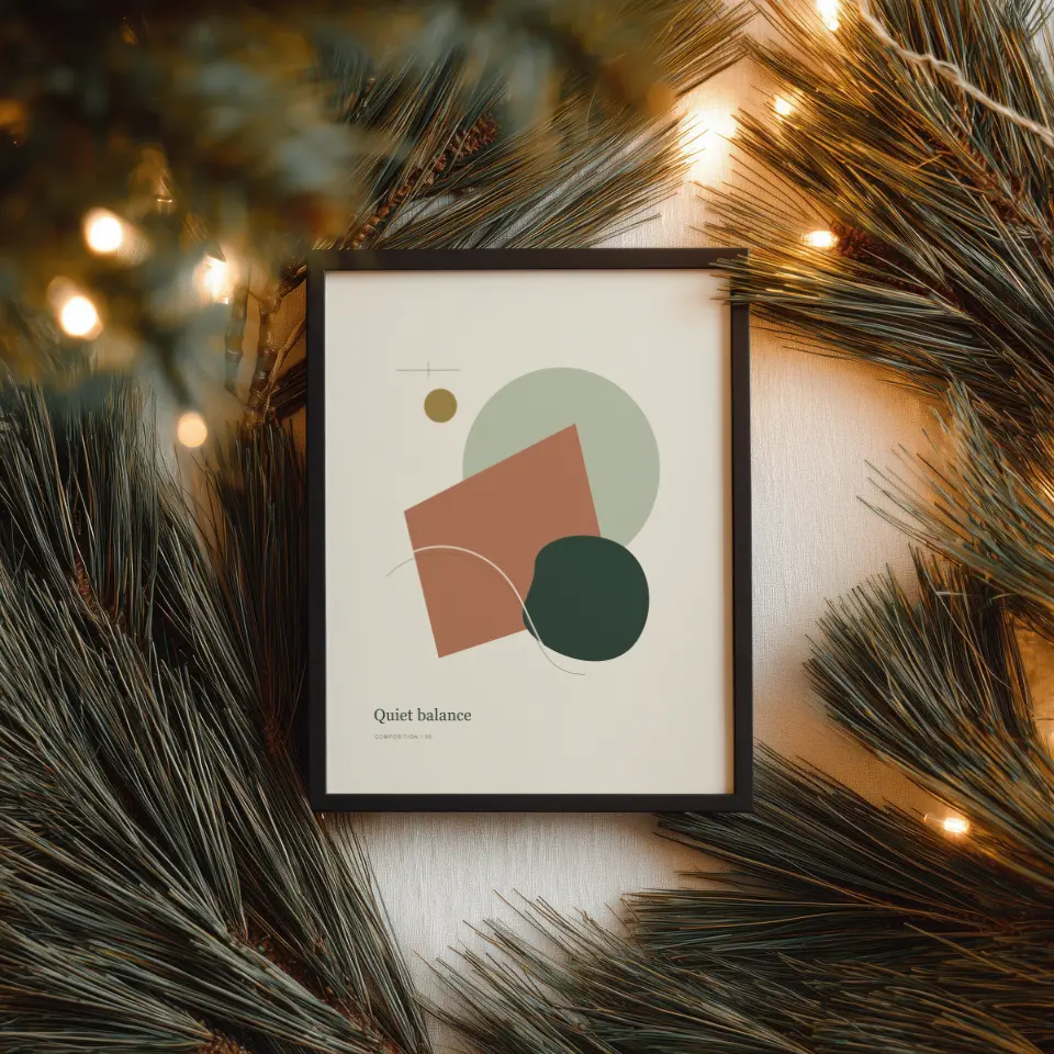 Evergreen Lights: Seen from directly above, a slim black frame lies on a white surface surrounded by long-needled pine boughs and strings of warm fairy lights, some in focus and some blurred into soft golden orbs.