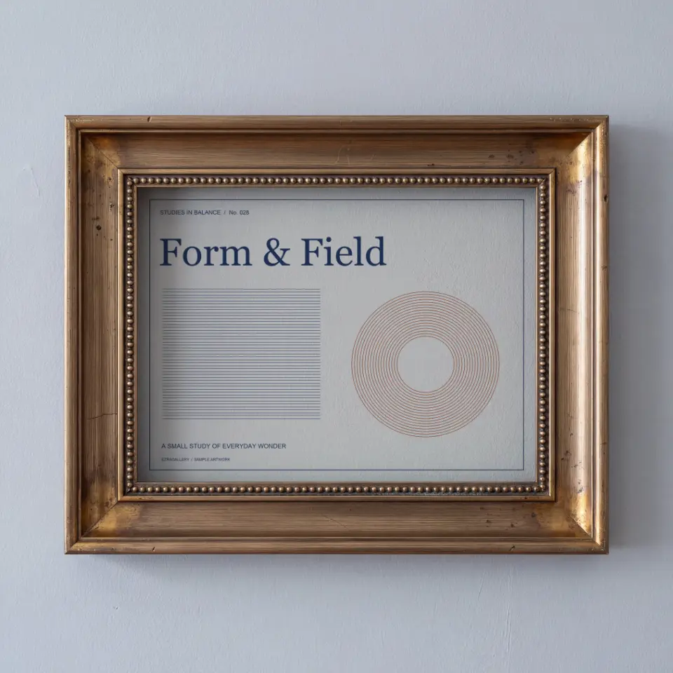 Gilded Slate: A wide antique gold frame with a row of beading along its inner edge hangs on a textured blue-grey wall, its broad bevelled surfaces worn to a soft, uneven sheen.